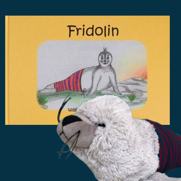 Bild von Plüschtier und Kinderbuch Fridolin
